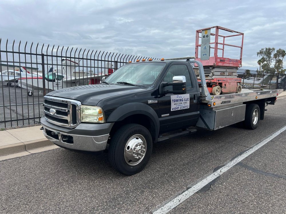 Polys Towing Service